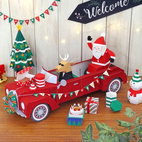 Модель Санта Клауса на Рождественской машине из бумаги/картона