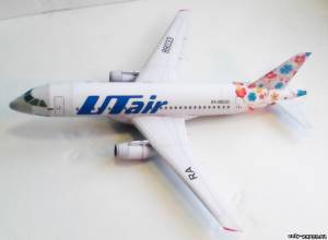 Модель самолета Suchoj Superjet 100 ЮтЭйр Хохлома из бумаги/картона